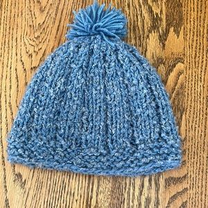 Handmade beanie with pompom.